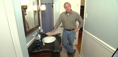 Danny Lipford in remodeled bathroom.