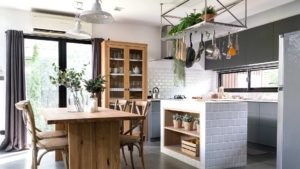 Cozy small kitchen with blue curtains