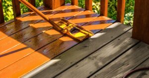 close-up of deck stain application