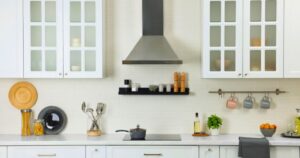 white kitchen with range hood