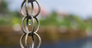 A rain chain installed on residential property.